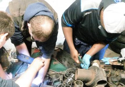 People working on the mg midget